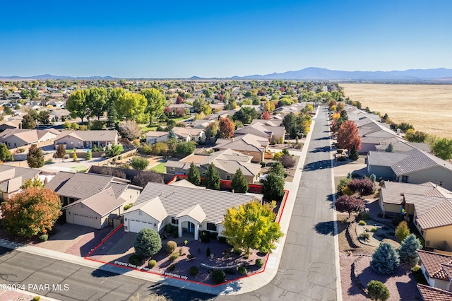 birds eye view of property featuring a mountain view