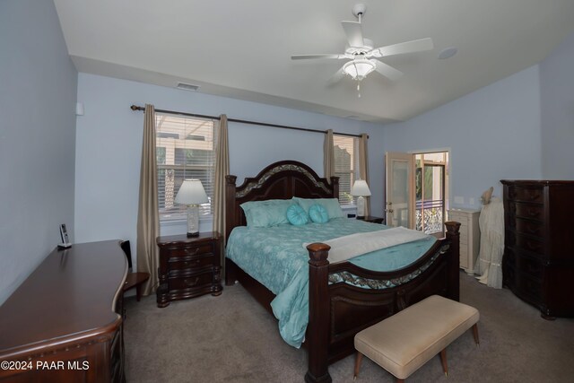 bedroom with light colored carpet and ceiling fan