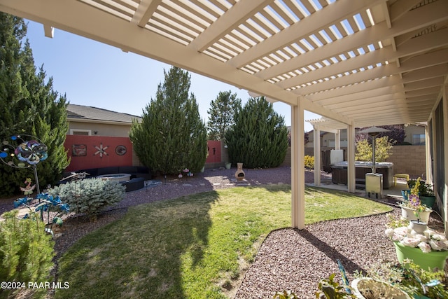 view of yard with a pergola and a hot tub