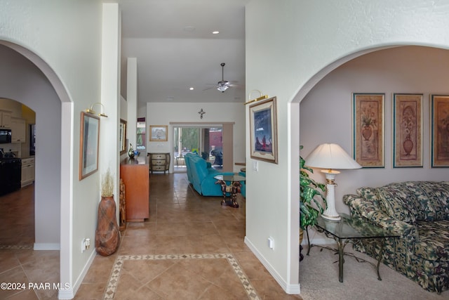 hallway with light tile patterned floors