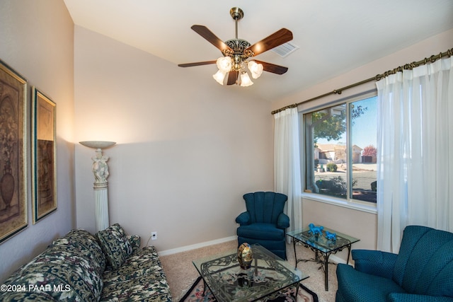 living room with carpet and ceiling fan