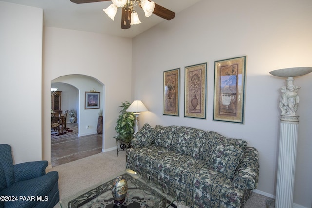 living room with carpet flooring and ceiling fan