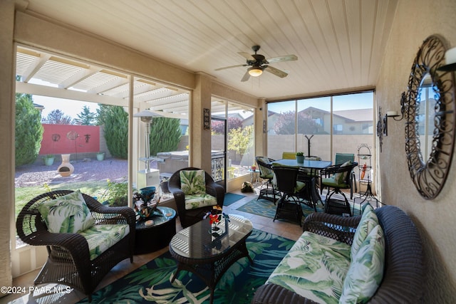 sunroom / solarium with ceiling fan