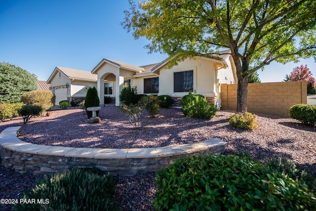 single story home featuring a garage