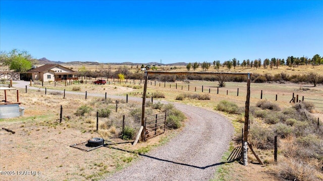 2354 N Kachina Ln, Chino Valley, AZ 86323 - view of yard featuring fence, a mountain view, and a rural view