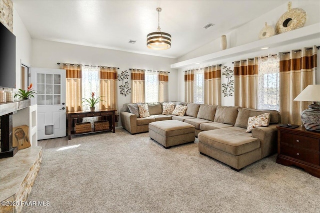 2354 N Kachina Ln, Chino Valley, AZ 86323 - carpeted living area with plenty of natural light, visible vents, and vaulted ceiling