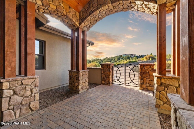 patio terrace at dusk with a porch
