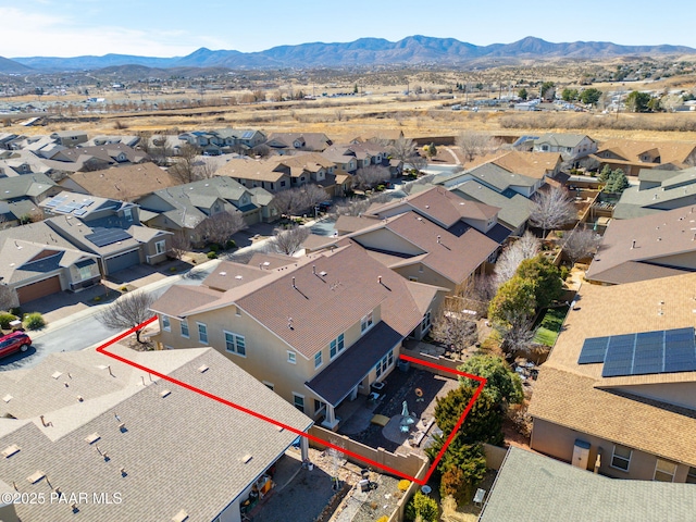 birds eye view of property featuring a residential view and a mountain view