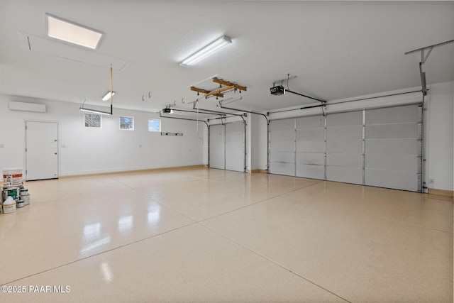 garage featuring a garage door opener and a wall mounted AC