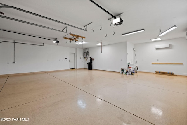 garage featuring baseboards and a garage door opener