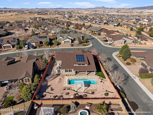 drone / aerial view featuring a mountain view and a residential view