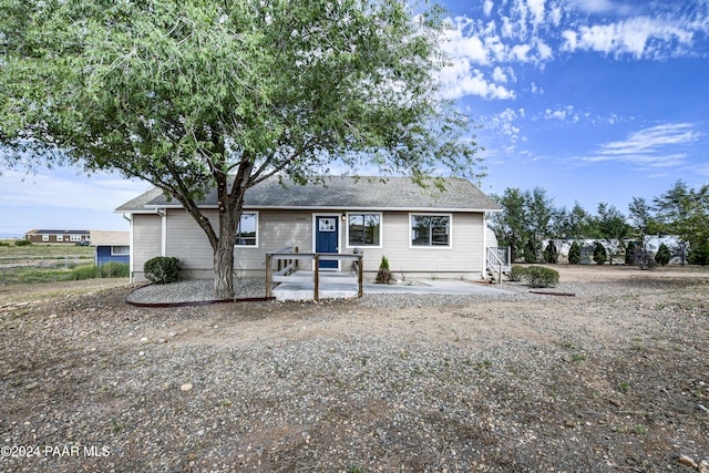 back of property with a patio area