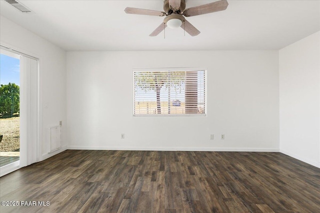 1445 S Table Mountain Rd, Chino Valley, AZ 86323 - empty room featuring wood finished floors, plenty of natural light, baseboards, and ceiling fan