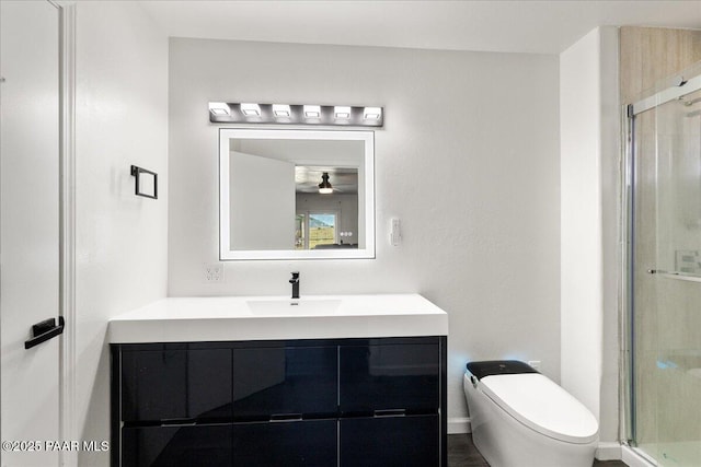 1445 S Table Mountain Rd, Chino Valley, AZ 86323 - full bathroom featuring vanity, a shower stall, toilet, and ceiling fan