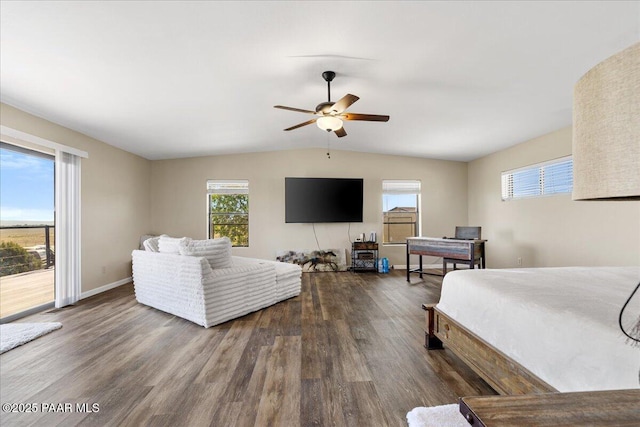 1445 S Table Mountain Rd, Chino Valley, AZ 86323 - bedroom with multiple windows, wood finished floors, baseboards, vaulted ceiling, and ceiling fan