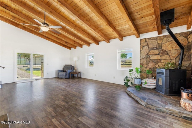 1445 S Table Mountain Rd, Chino Valley, AZ 86323 - unfurnished living room featuring a wood stove, wooden ceiling with exposed beams, wood finished floors, ceiling fan, and high vaulted ceiling