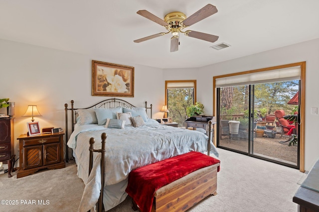 bedroom featuring visible vents, carpet flooring, a ceiling fan, and access to outside