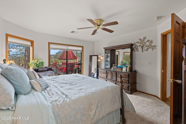 bedroom with visible vents, a ceiling fan, carpet, baseboards, and access to exterior