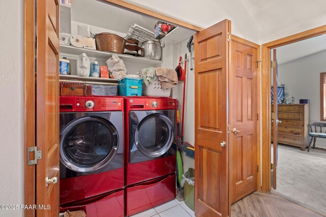 washroom featuring laundry area, carpet flooring, and independent washer and dryer