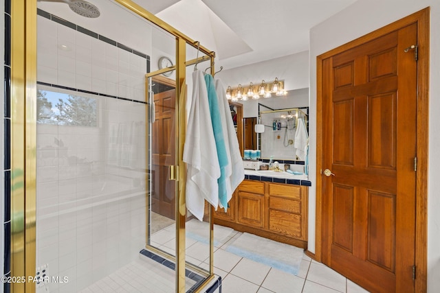 bathroom with tile patterned floors and a shower stall