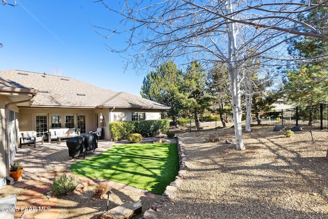 view of yard featuring an outdoor living space and a patio