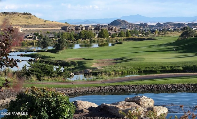 view of property's community with a water and mountain view