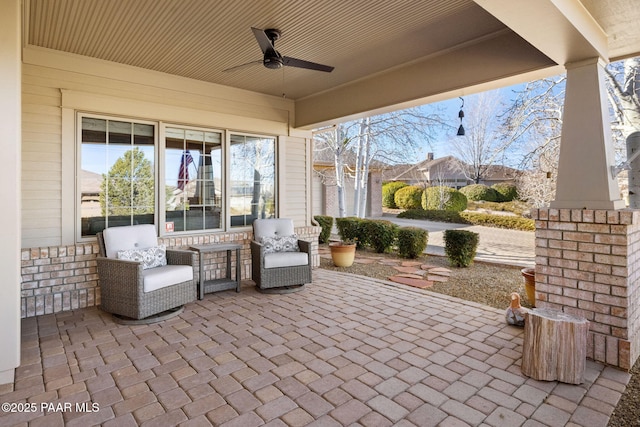 view of patio with ceiling fan