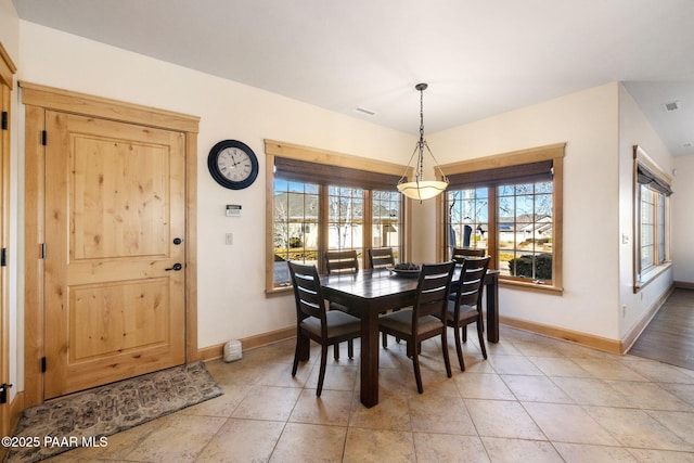 dining room with light tile patterned floors