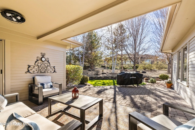 view of patio / terrace featuring an outdoor hangout area and a grill