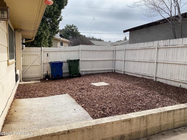 view of yard with a gate and fence