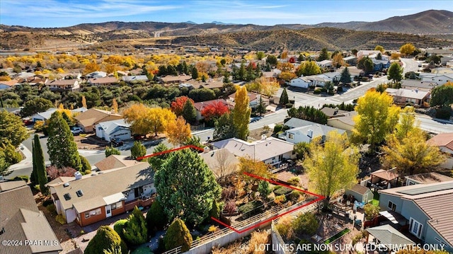 drone / aerial view featuring a mountain view