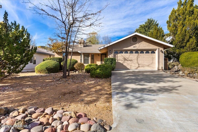 ranch-style home with a garage