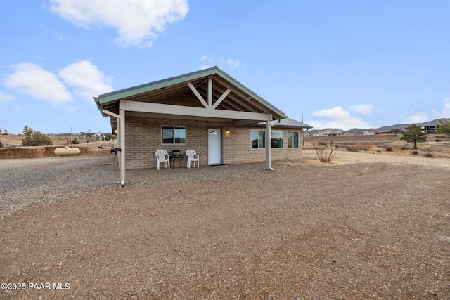 view of front of house featuring a mountain view