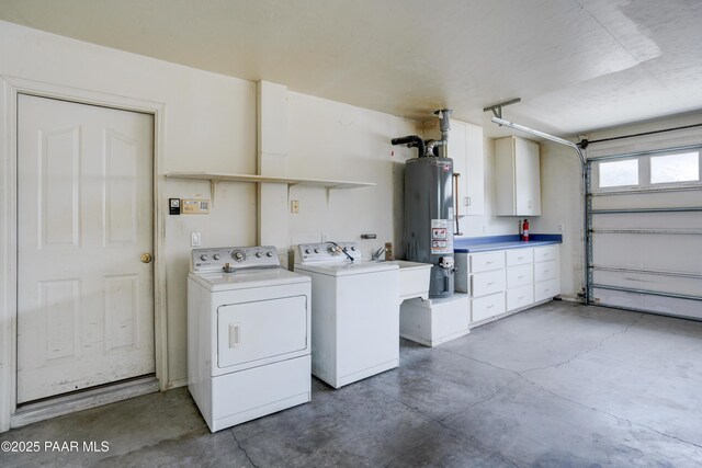 2312 Loma Vista Dr, Prescott, AZ 86305 - washroom featuring a garage, washing machine and dryer, water heater, and laundry area