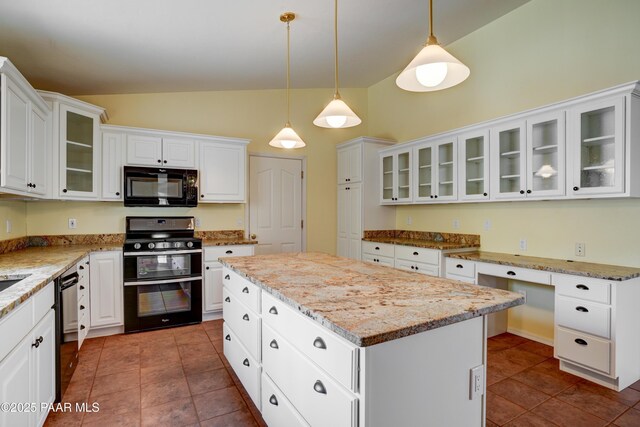 2312 Loma Vista Dr, Prescott, AZ 86305 - kitchen featuring a kitchen island, black appliances, white cabinets, and vaulted ceiling