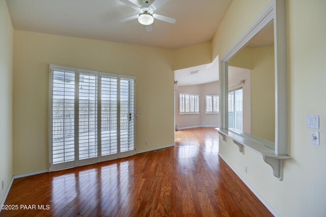 2312 Loma Vista Dr, Prescott, AZ 86305 - unfurnished room featuring visible vents, baseboards, ceiling fan, and wood finished floors