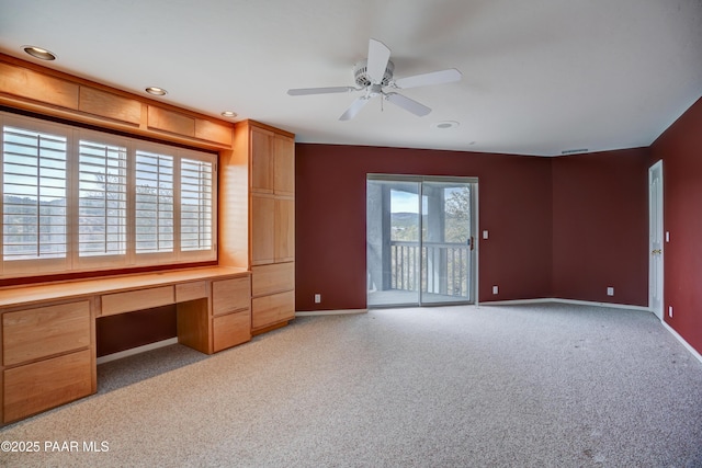 2312 Loma Vista Dr, Prescott, AZ 86305 - unfurnished office with baseboards, carpet floors, a ceiling fan, and built in study area