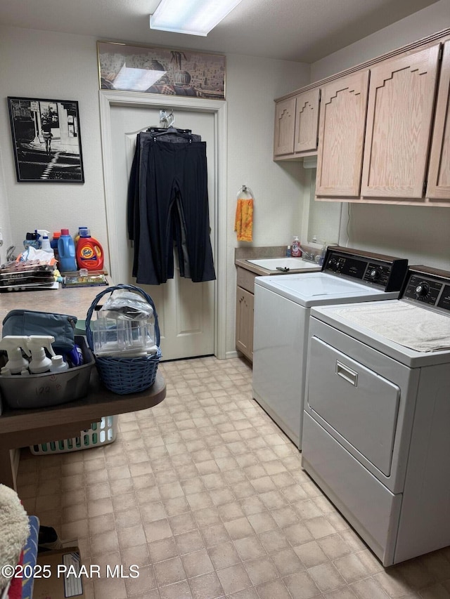 2350 W Gunsite Rd, Paulden, AZ 86334 - washroom featuring independent washer and dryer, cabinet space, and light floors