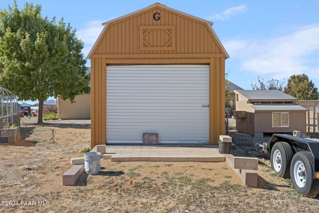 exterior space with a garage