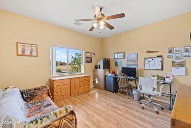 office area with ceiling fan and light hardwood / wood-style floors