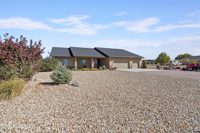 ranch-style house with a garage