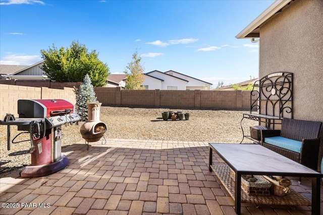 view of patio with a grill