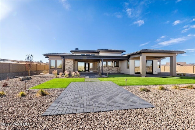 5285 High Cliff Way, Prescott, AZ 86301 - back of property with a patio area and a yard