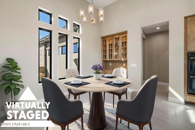 5285 High Cliff Way, Prescott, AZ 86301 - dining area with a towering ceiling and an inviting chandelier