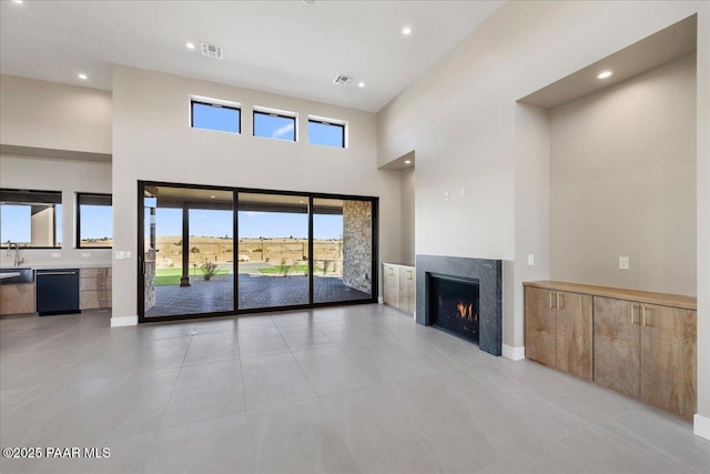 5285 High Cliff Way, Prescott, AZ 86301 - unfurnished living room with light tile patterned floors and a high ceiling