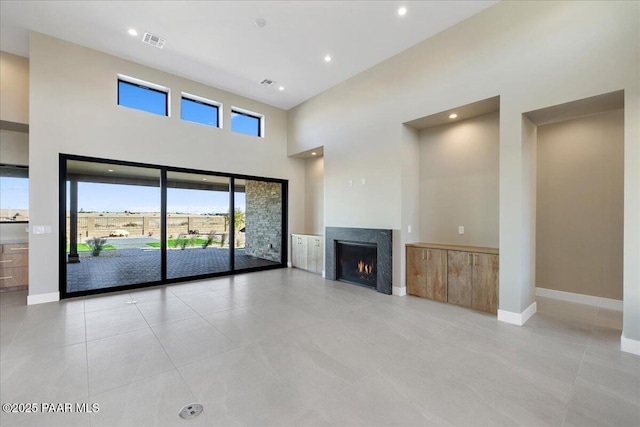 5285 High Cliff Way, Prescott, AZ 86301 - unfurnished living room with light tile patterned floors and a high ceiling