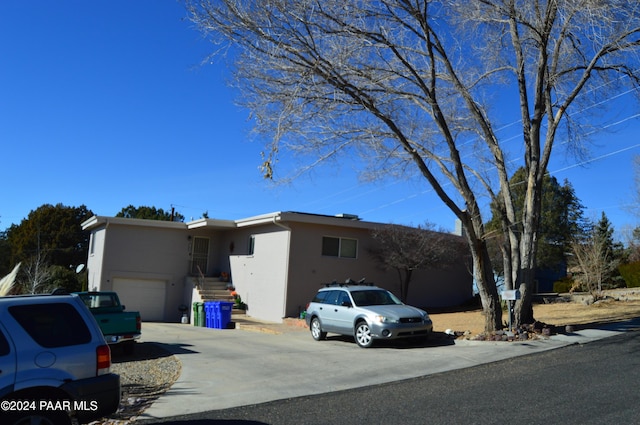 view of front of home with a garage