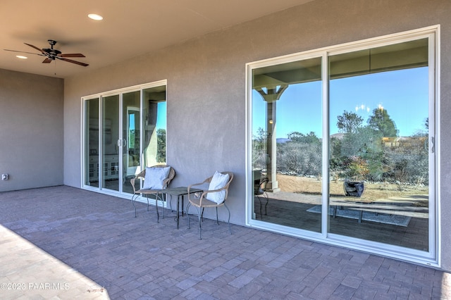 view of patio with ceiling fan