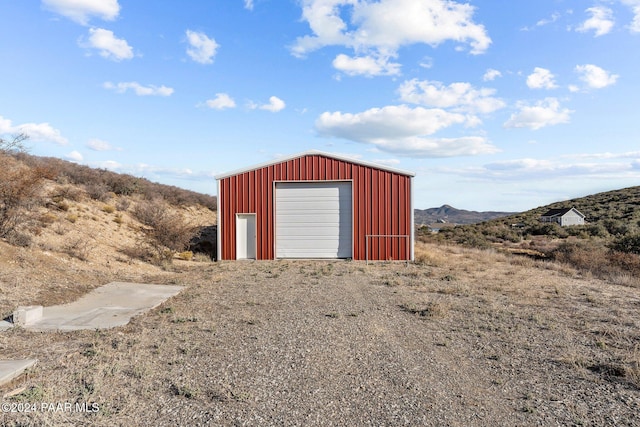 11645 E Prescott Dells Rnch Rd, Dewey-Humboldt, AZ 86327 - view of outdoor structure featuring a mountain view and a garage