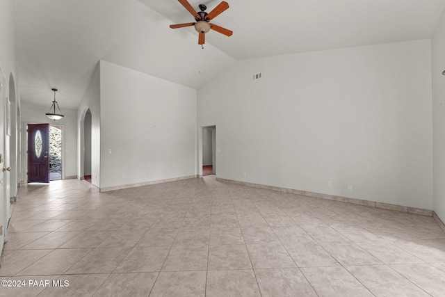 11645 E Prescott Dells Rnch Rd, Dewey-Humboldt, AZ 86327 - spare room featuring vaulted ceiling, ceiling fan, and light tile patterned flooring